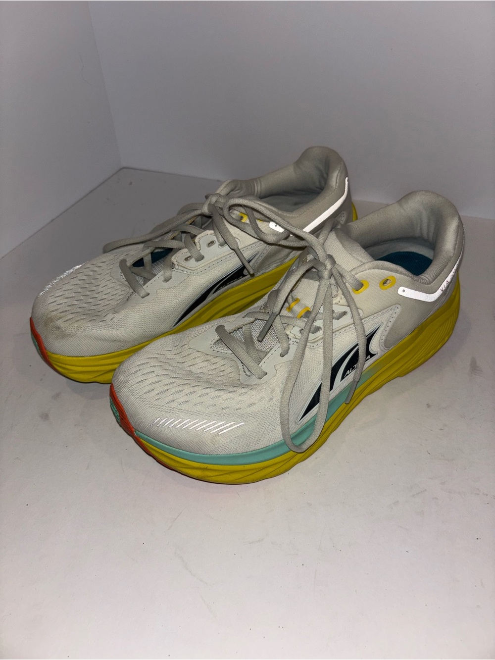 Altra men’s running Sneakers with Yellow and Teal Accents
